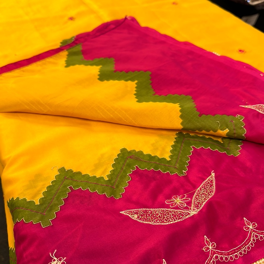 Silk yello and pink saree gently used with embroidery and Stitched  blouse